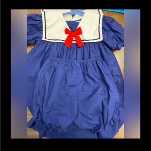 Navy Blue and White Sailor Dress with Red Bow